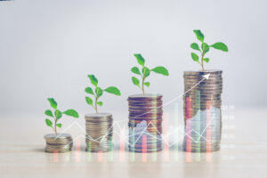 Stack money coin and tree with business graph finance economy bank and chart investment wealth accounting development concept.